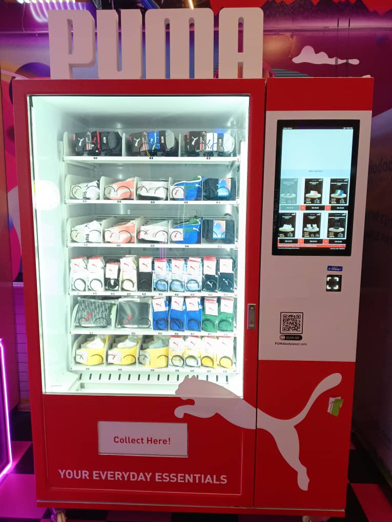 PUMA sport and apparel vending machine with athletic wear and accessories